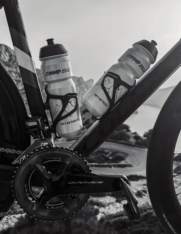 Cycling bottles at a coastal finish